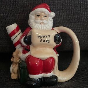 Festive Vintage Santa Claus Teapot Mug with Red and White Details